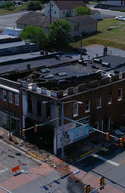 Aerial Shot of D.R. Music Building as crews fight a fire.